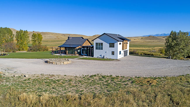 Front Entrance With Large Gravel Driveway Custom Home Livingston Mt